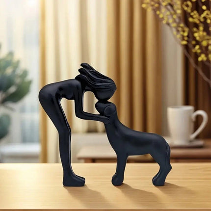 Black minimalist sculpture of a human and a dog. Freeze the moment of embrace, a declaration of eternal companionship dedicated to you.